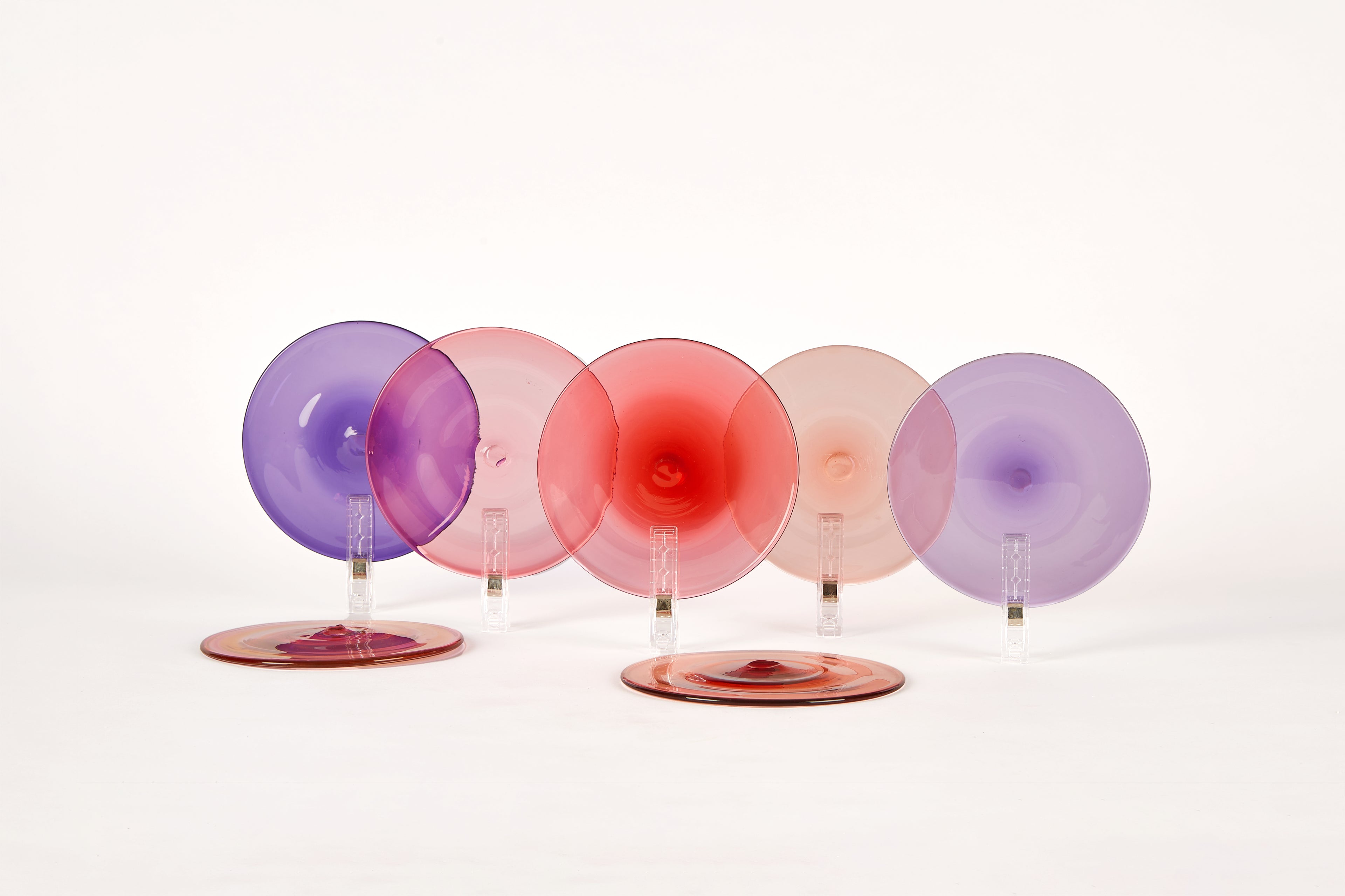 Selection of pink and purple roundels facing forward